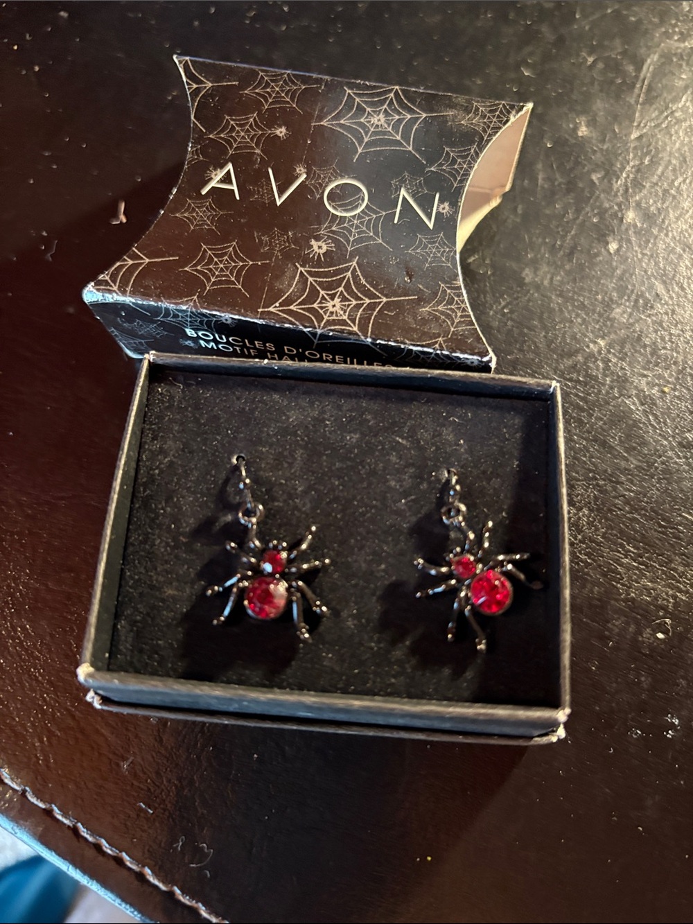 Avon Black Spider Earrings with Red Gem Centers